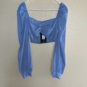 Fashion Nova blue crop top with mini white dots